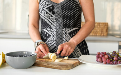 Woman Cutting Bananas
