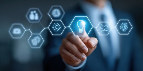 Businessman Touching Digital Interface With Lit Bulb Icon on Blue Background Concept of Innovative Ideas