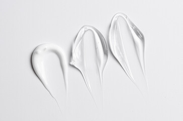 A sample of white and transparent cosmetic cream