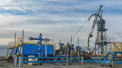 The Northern gas field. Summer. Installation for lowering a flexible pipe into a well. Equipment...