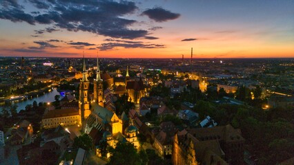 Evening Panorama of Wrocław – Aerial View of Ostrów Tumski with Illuminated Street Lamps