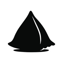 Silhouette of a sailboat with a prominent sail.