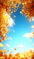 Bright orange leaves dance in the wind under a clear blue sky on a sunny autumn day