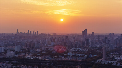 Fototapeta premium Aerial photography of the city in the sunset