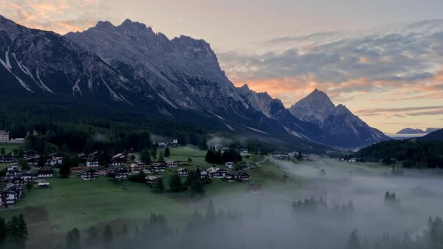 Cortina d' Ampezzo in Italian Alps, Winter Olympics in Italy, winter skiing resort in the Dolomites, Cima Tofana di Mezzo. Autumn morning mountain forest. Beautiful meadow in the Italian Alps . 