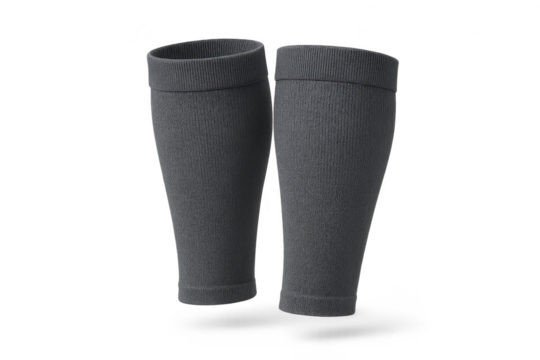 Two dark grey athletic or soccer socks isolated on transparent background