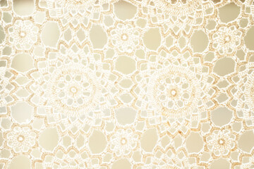 白いレースのカーテンのクローズアップ。幾何学模様の背景素材