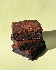 Fudgy Chocolate Brownies on Colorful Background &ndash; Sweet Dessert Food Photography