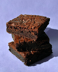 Fudgy Chocolate Brownies on Colorful Background &ndash; Sweet Dessert Food Photography