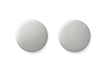 Two circular brushed metal discs isolated on a transparent background, sleek