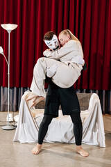Role-playing between a mime and an actress on the theatre stage