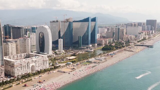 Batumi, Georgia - 19th august, 2025: Aerial Batumi city highrise skyline beachfront landmarks, new real estate property buildings hotels.Popular summer travel destination Adjara region.Black sea coast