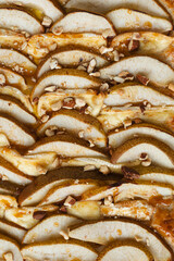 Puff pastry pie with camembert, pear slices, honey and nuts.