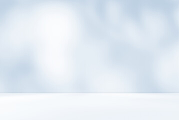 Empty blue room studio with shadow of leaves on concrete wall and floor for product presentation. Sunlight effect shadow. Minimal winter backdrop. Cosmetic, beauty and fashion showroom.