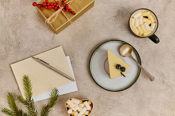 Festive preparation for Christmas and New Year with treats, decorations, and warm drinks on display.