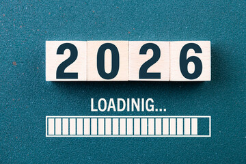 Wooden cube block 2026, countdown to 2026. Loading year to 2026. New year start concept, business, resolutions, goals, inspiration, success, ideas