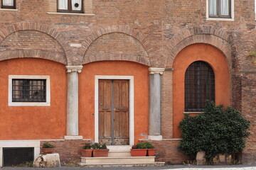 Historical House Facade with Columns in Rome, Trastevere Neighbourhood, Italy