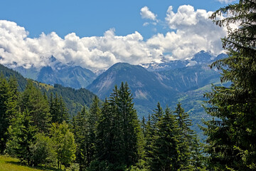 Fototapeta premium Landscape with cloudy mountains in La Vanoise nature reserve, France. 