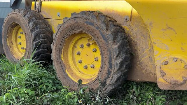 Mini loader wheels. Mud and clay on tires