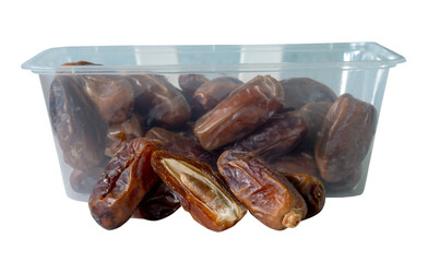 Ripe dried date palm fruits witth half in stack in transparent plastic package isolated with clipping path in png file format Concept of iftar food in Ramadan month for Muslims