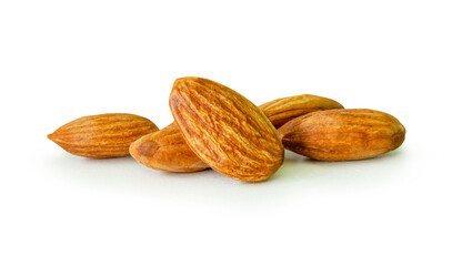 Brown almond nuts in stack isolated on white background with clipping path