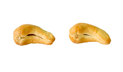 A set of two roasted or baked cashew nuts isolated with clipping path in png file format