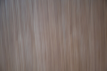 The image is of a wooden surface with a grainy texture