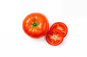 Fototapeta premium Close-up view of a fresh ripe red tomato positioned next to two sliced pieces on a clean white background highlighting its texture and color.