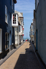 Fototapeta premium Very nice old street in Cromer, Norfolk, leading to the sea
