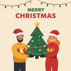 The couple holds a small Christmas tree to celebrate Christmas