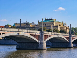 Fototapeta premium Stunning Prague Bridge Over Vltava River: Iconic Scenic Travel Photography for Marketing, Wallpaper, and Digital Use. Ultra High Resolution 