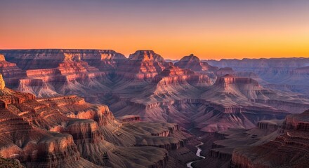 The Grand Canyon at sunset, with vibrant colors and dramatic landscapes.