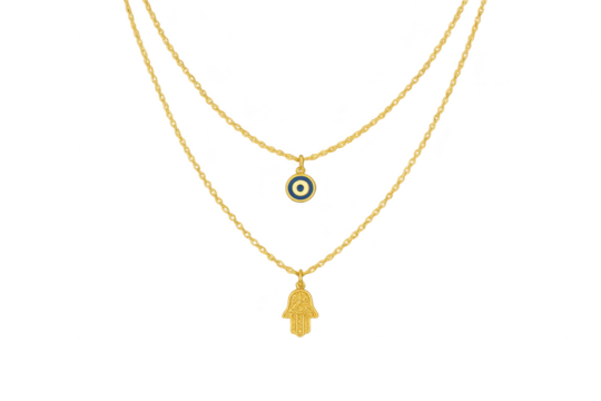 Gold layered necklace with Hamsa and evil eye pendant on transparent background