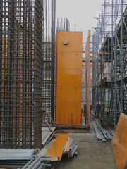 A wooden wall installed within the rabar cages.
