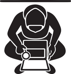 Top down silhouette of a person crouching and intently working on a laptop computer with a magnifying glass