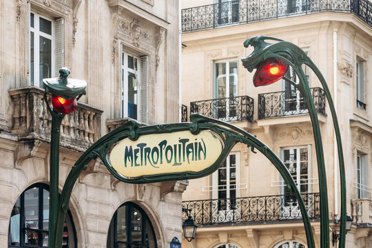 Paris, France - September 12, 2025: Hector Guimard&rsquo;s classic Art Nouveau &ldquo;Metropolitain&rdquo; metro entrance sign with green ironwork and vintage lettering.