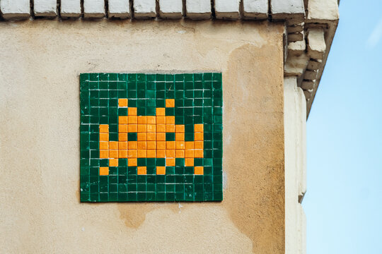 Paris, France - September 12, 2025: Space Invader mosaic street art near the Luxembourg Gardens in Paris