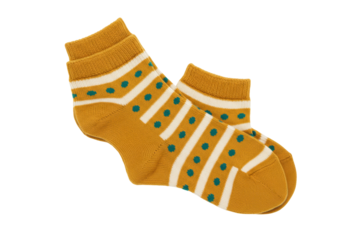 Isolated Pair of knitted mustard-yellow socks with blue polka dots and white stripes pattern