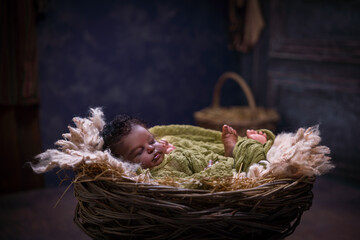 Sleeping African baby in Christmas Nativity scene