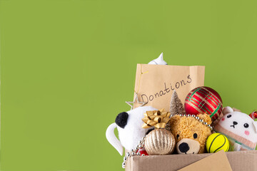 Donating gifts and toys to charity for Christmas holiday concept. Tradition holiday toys drive,...