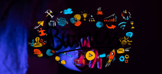 Boost your business! Stock photo of hands with colorful business icons, growth, and success.