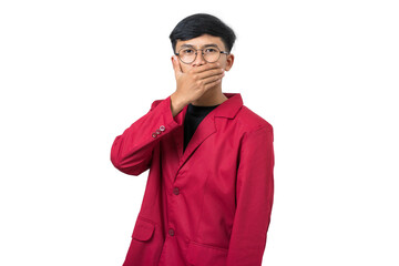 Young college student shushing gesture with finger on lips isolated on white background
