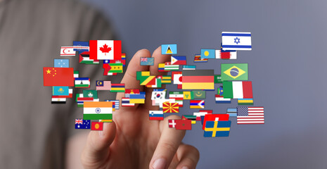 A visual representation of international flags floating in the air, held by a person. Perfect for...