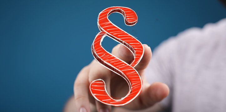 Person's hand pointing at a red paragraph symbol against a blue background. Represents the legal concept, law, or rules and regulations.