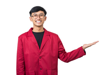 Smiling young college student showing something with hand isolated on white background