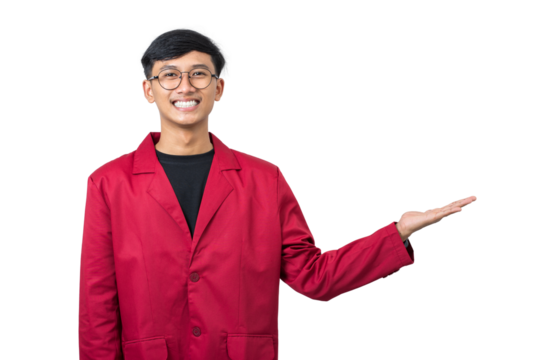 Smiling young college student showing something with hand isolated on white background