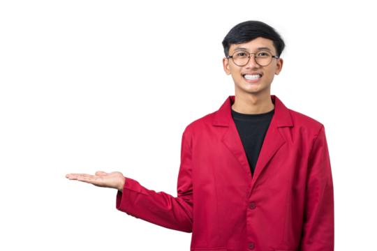 Smiling young college student showing something with hand isolated on white background