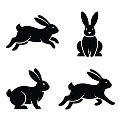 Four silhouettes of rabbits in various poses capturing movement and static stance for digital or print applications silhouette