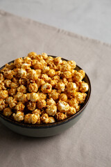 Homemade Caramel Pop Corn in a Bowl, low angle view.