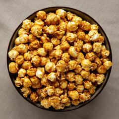Homemade Caramel Pop Corn in a Bowl, top view. Overhead, from above.